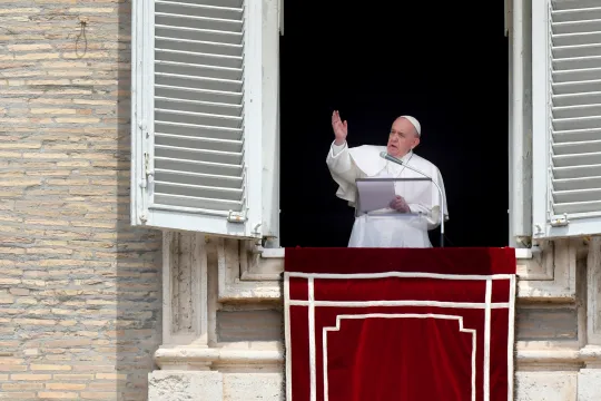 Pope Francis speaks from the window of the apostolic palace overlooking St. Peter's Square on May 30, 2021 in The Vatican during the weekly Angelus prayer.  Alberto PIZZOLI / AFP