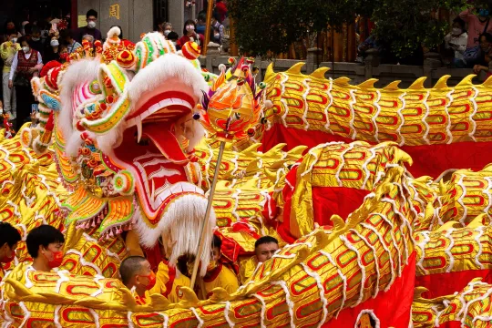 A 238m-long dragon dance is performed in front of the A-Ma Temple during celebrations on the first day of the Chinese lunar new year in Macau on January 22, 2023.  Eduardo Leal / AFP