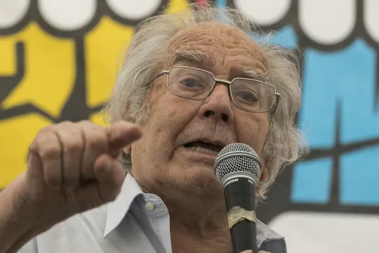 Argentine 1980 Nobel Peace Prize laureate Adolfo Perez Esquivel speaks during the People's Summit outside the Congress building in Buenos Aires on November 29, 2018. Global leaders gather in the Argentine capital for a two-day G20 summit beginning on Friday likely to be dominated by simmering international tensions over trade.