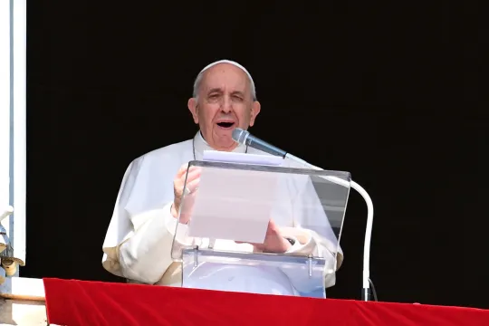 Pope Francis delivers his message from the window of the apostolic palace overlooking St. Peter's Square, as he holds his weekly Angelus prayer in The Vatican on October 24, 2021.  