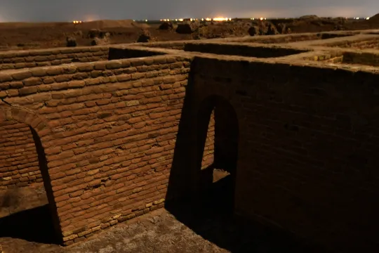 This picture taken late on February 25, 2021 shows a long-exposure moonlit view of the site where Abraham, the father of three religions -- Judaism, Christianity and Islam -- is thought to have been born in the ancient city of Ur that falls now in southern Iraq's Dhi Qar province, around 375 kilometres southeast of Baghdad. The March 5-8 visit -- the first ever by a pope -- will include inter-religious prayers at the ancient city of Ur in Iraq's south. The Pope's prayers will bring Christians and Muslims to