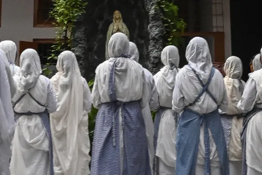 Nuns from Missionaries of Charity attend a special prayer to mark the 111th birth anniversary of Mother Teresa, at the Mother House in Kolkata on August 26, 2021.  