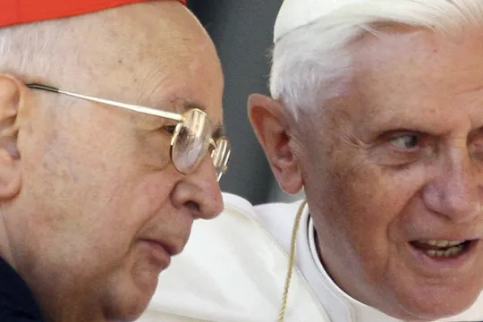 Pope Benedict XVI talks with Cardinal Eduardo Martinez Somalo of Spain (L) at the end of his weekly general audience in St. Peter's Square at the Vatican 31 May 2006. The Pontiff called on thousands of pilgrims at the Vatican on Wednesday to pray for the success of peace efforts in East Timor, where more than 2,000 foreign troops have been deployed to help restore order. 