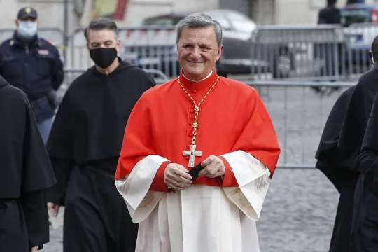 Maltese newly appointed Cardinal Mario Grech (C) arrives for a consistory ceremony in the Saint Peter's basilica at the Vatican, 28 November 2020. Pope Francis installed 13 new Cardinals, including the first African-American.