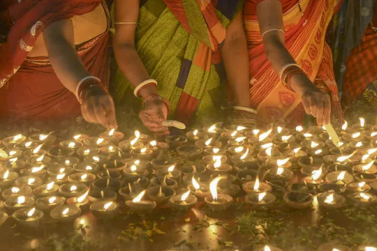 Devotees perform a ritual by lighting diyas (earthen lamps) on the occasion of Karthika or Kartik month in Hyderabad, on November 12, 2019. Karthika or Kartik is one of the most auspicious months in the lunar calendar which begins on the day after Diwali, the Festival of Lights and ends after 30 days. It is considered very sacred by the devotees of Lord Shiva and Lord Vishnu.