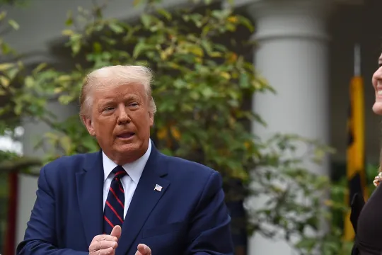 US President Donald Trump announces his US Supreme Court nominee, Judge Amy Coney Barrett (R), in the Rose Garden of the White House in Washington, DC on September 26, 2020. Barrett, if confirmed by the US Senate, will replace Justice Ruth Bader Ginsburg, who died on September 18. Olivier DOULIERY / AFP
