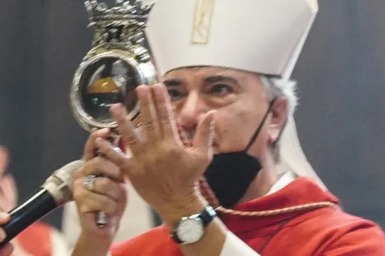 The archbishop of Naples Domenico Battaglia holds a vial believed to contain the blood of the 3rd century saint San Gennaro (Saint Januarius) during the so-called liquefaction miracle, in the Chapel of the Treasury, in Naples, Italy, 19 September 2021. Faithful gather three times a year to witness the liquefaction of the otherwise coagulated blood of the saint. EPA/CESARE ABBATE