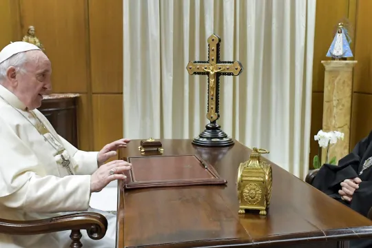 This photo taken and handout on December 22, 2021 by The Vatican Media shows Pope Francis meeting (L) with Hilarion Alfeyev, bishop of the Russian Orthodox Church, the titular Metropolitan of Volokolamsk, the chairman of the Department of External Church Relations and a permanent member of the Holy Synod of the Patriarchate of Moscow, during a private audience in The Vatican. 