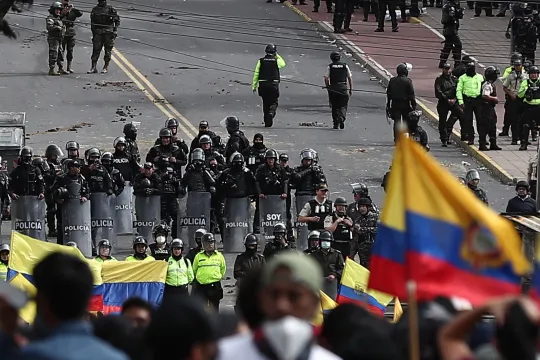 Dozens of police and riot police stand guard during the national strike called by the Confederation of Indigenous Nationalities of Ecuador, on the thirteenth day of the anti-government demonstrations, in Quito, Ecuador, 25 June 2022. The protests are taking place based on a list of ten demands of the indigenous movement, among them that fuel prices be reduced and frozen, that the prices of basic necessities be controlled, that state companies not be privatized and that oil and mining activity in the Amazon 