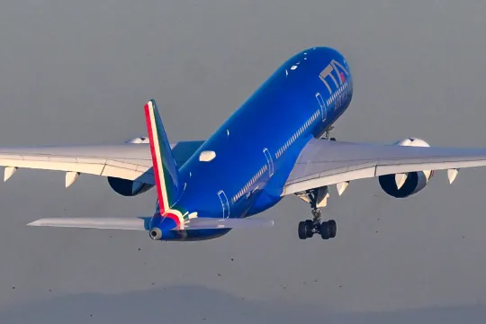An Airbus A350-900 bearing the ITA Airways livery takes off on January 31, 2023 from Rome's Fiumicino airport, transporting the Pope heading to Democratic Republic of Congo and South Sudan. Pope Francis heads to Democratic Republic of Congo and South Sudan, delivering a message of peace and reconciliation to two sub-Saharan African nations plagued by conflict. The pontiff flies to the Congolese capital Kinshasa on January 31 before heading on Friday to Juba, the capital of South Sudan where he will be joine