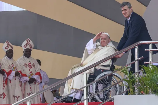 Pope Francis (2nd R) departs after presiding over the mass at the N'Dolo Airport in Kinshasa, Democratic Republic of Congo (DRC), on February 1, 2023. Arsene Mpiana / AFP