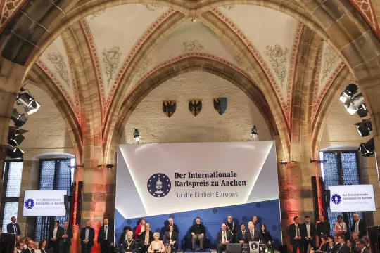  Ukrainian President Volodymyr Zelensky (C) receives the Charlemagne Prize (Karlspreis) during the award ceremony in the town hall of Aachen, Germany, 14 May 2023. This year's prize will be awarded to Ukraine's President Volodymyr Zelensky and the Ukrainian people. The International Charlemagne Prize of Aachen has been awarded annually since 1950 to people who have contributed to the ideals upon which Europe has been founded. EPA/FRIEDEMANN VOGEL