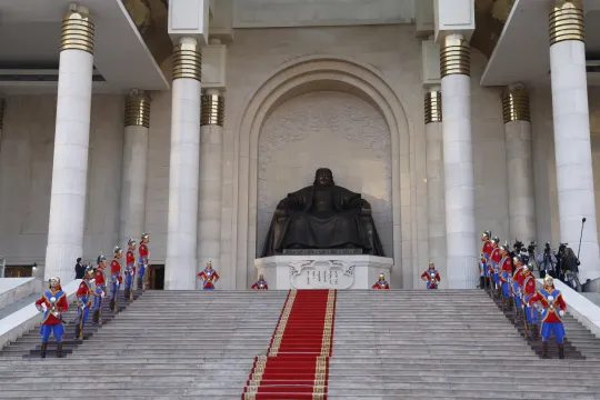 Members of the guard of honour are seen during a ceremonial welcome for France's President Emmanuel Macron at the Government Palace in Ulaanbaatar on May 21, 2023. Ludovic MARIN / AFP
