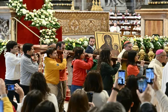 Youths hand over the cross of the World Youth Day to organizers of the next edition that will be held in Seoul, South Korea, in 2027, during a mass presided by Pope Francis, in St. Peterâ€™s Basilica, at the Vatican, 24 November 2024. EPA/FABIO FRUSTACI