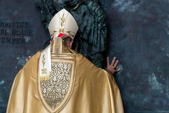 Italian Cardinal Baldassare Reina opens a Holy Door at St John in Lateran basilica in the Vatican on December 29, 2024, as part of the Catholic Jubilee Year. Angelo CARCONI - AFP