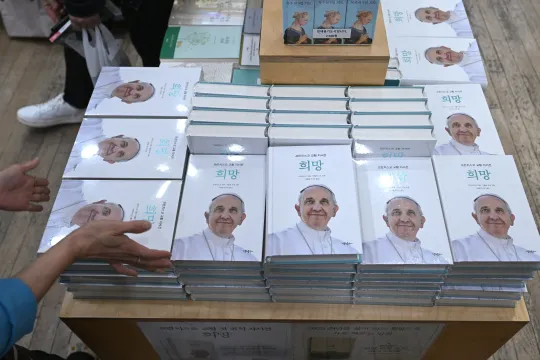 Books of Pope Francis’ autobiography in the Korean language are displayed in a bookstore at Myeongdong Cathedral in Seoul on April 21, 2025. Pope Francis died on April 21, aged 88, a day after making a much hoped-for appearance at Saint Peter's Square on Easter Sunday, the Vatican said in a statement. Jung Yeon-je / AFP