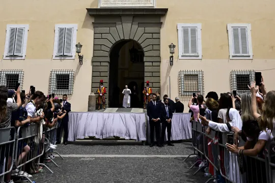 Pope Leo XIV addresses the crowd for the Angelus prayer in Piazza della Liberta (Liberty Square) in front of Palazzo Apostolico (Apostolic Palace) in the summer papal estate in Castel Gandolfo, 40 km southeast of Rome, on July 13, 2025. The newly elected Pope Leo XIV, takes a summer break from July 6 to 20 at the papal palace at Castel Gandolfo, outside Rome, a longtime country residence for pontiffs that Francis declined to use. Tiziana FABI / POOL / AFP