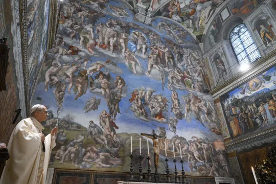 This handout photo taken and released on January 11, 2026, by Vatican Media, the Vatican press office, shows Pope Leo XIV during the Feast of the Baptism of the Lord, during which infants are baptised, in the Sistine Chapel, at the Vatican. VATICAN MEDIA / AFP