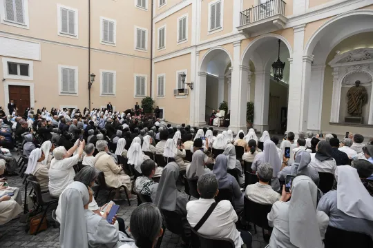 A handout photo made available by Vatican Media shows Pope Leo XIV (C-rear) in the courtyard of the Apostolic Palace of Castel Gandolfo, Italy, 12 July 2025, while attending the General Chapters of various religious institutes. EPA/Vatican Media