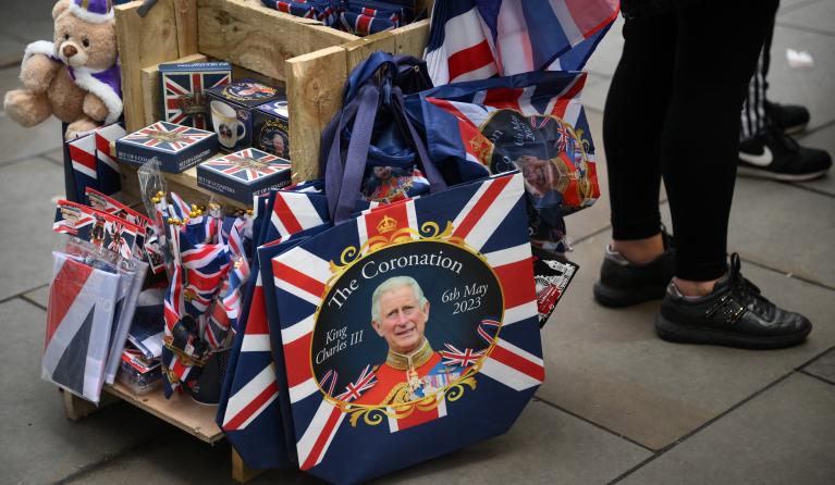 Royal souvenirs are seen for sale on a street in central London, on April 28, 2023 ahead of the coronation ceremony of Charles III and his wife, Camilla, as King and Queen of the United Kingdom and Commonwealth Realm nations, on May 6, 2023. Daniel LEAL / AFP