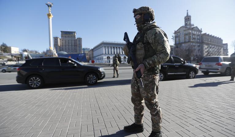A Ukrainian soldier stands at Maidan Nezalezhnost (Independence Square) in Kiev (Kyiv), Ukraine, 28 February 2022. Russian troops entered Ukraine on 24 February prompting the country's president to declare martial law and triggering a series of severe economic sanctions imposed by Western countries on Russia.