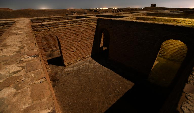 This picture taken late on February 25, 2021 shows a long-exposure moonlit view of the site where Abraham, the father of three religions -- Judaism, Christianity and Islam -- is thought to have been born in the ancient city of Ur that falls now in southern Iraq's Dhi Qar province, around 375 kilometres southeast of Baghdad. The March 5-8 visit -- the first ever by a pope -- will include inter-religious prayers at the ancient city of Ur in Iraq's south. The Pope's prayers will bring Christians and Muslims to