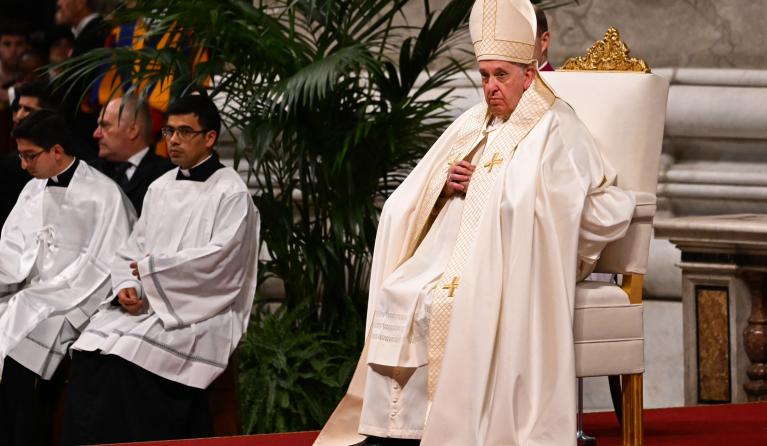 Pope Francis looks on as celebrates mass for Our Lady of Guadalupe on December 12, 2022 at St. Peter's basilica in The Vatican.  Andreas SOLARO / AFP