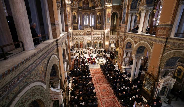 Attendees take part in the funeral service of former King of Greece Constantine II in the Metropolitan Cathedral of Athens, on January 16, 2023. Dozens of European royals and hundreds of Greeks gathered in Athens on January 16, 2023, for the funeral of Greece's last king, Constantine II, who died aged 82. STOYAN NENOV / POOL / AFP