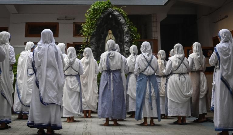 Nuns from Missionaries of Charity attend a special prayer to mark the 111th birth anniversary of Mother Teresa, at the Mother House in Kolkata on August 26, 2021.  