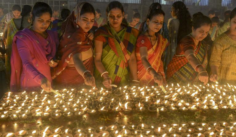 Devotees perform a ritual by lighting diyas (earthen lamps) on the occasion of Karthika or Kartik month in Hyderabad, on November 12, 2019. Karthika or Kartik is one of the most auspicious months in the lunar calendar which begins on the day after Diwali, the Festival of Lights and ends after 30 days. It is considered very sacred by the devotees of Lord Shiva and Lord Vishnu.
