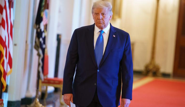US President Donald Trump arrives for an event honoring Bay of Pigs veterans in the East Room of the White House in Washington, DC on September 23, 2020. MANDEL NGAN / AFP