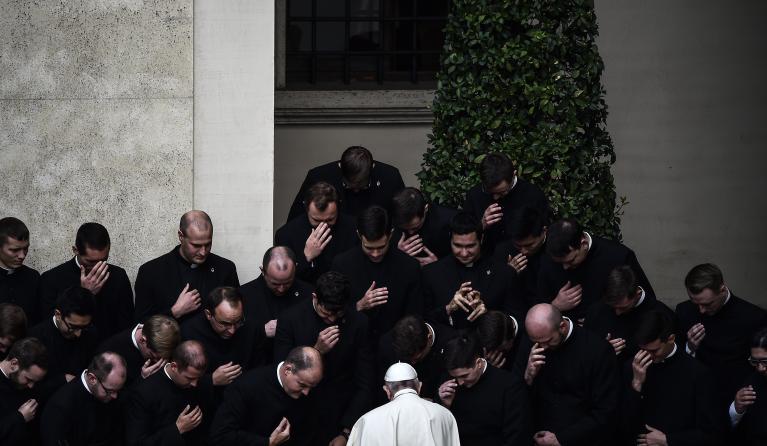 Pope Francis blesses priests during a limited public audience at the San Damaso courtyard in The Vatican on September 30, 2020 during the COVID-19 infection, caused by the novel coronavirus. Filippo Monteforte / AFP
