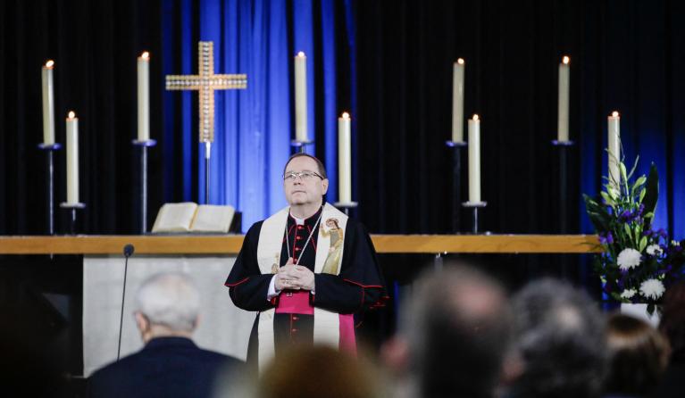 Georg Bätzing, Chairman of the German Bishops' Conference (DBK), addresses guests during an ecumenical service for Germany's victims of the coronavirus (Covid-19) pandemic at Berlin's Kaiser Wilhelm Memorial Church on April 18, 2021. Germany holds a national memorial service on April 18 for its 80,000 victims of the coronavirus pandemic, sharing the pain of grieving families and those who died alone because of Covid curbs.