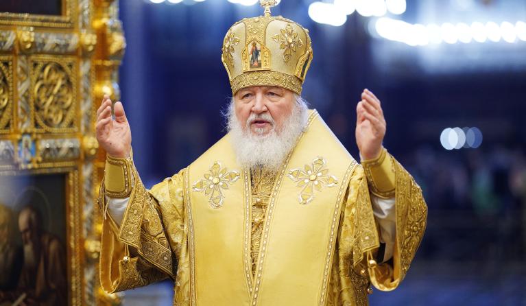 Russia's Orthodox Patriarch Kirill leads a religious service at the Cathedral of Christ the Saviour in Moscow on February 27, 2022. The head of the Russian Orthodox Church on February 27 called Moscow's opponents in Ukraine "evil forces", speaking on the fourth day of the Kremlin's invasion of its pro-Western neighbour.