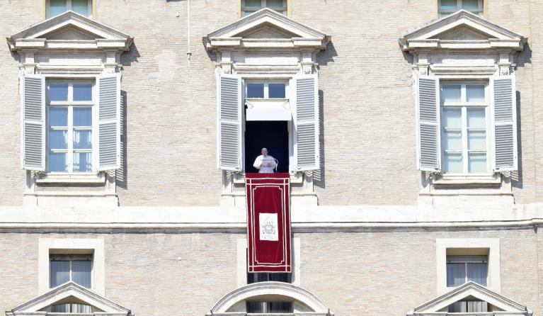 Pope Francis leads the Angelus prayer from the window of his office overlooking Saint Peter's Square at the Vatican, 06 March 2022. 