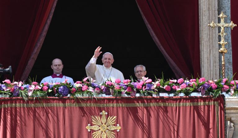 Pope Francis delivers the Easter "Urbi et Orbi" blessing from the balcony of St. Peter's Basilica overlooking St. Peter's square on April 17, 2022 in The Vatican. 