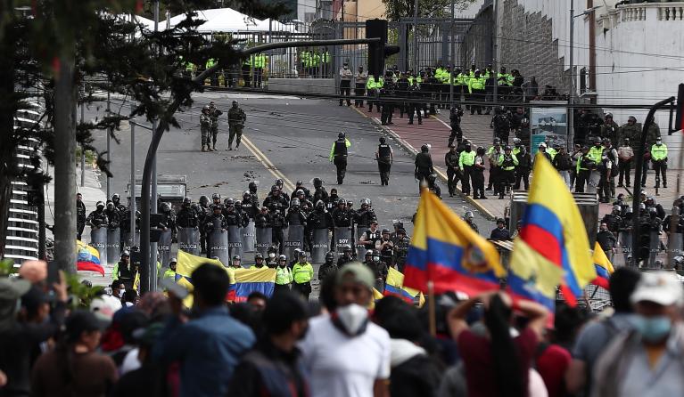 Dozens of police and riot police stand guard during the national strike called by the Confederation of Indigenous Nationalities of Ecuador, on the thirteenth day of the anti-government demonstrations, in Quito, Ecuador, 25 June 2022. The protests are taking place based on a list of ten demands of the indigenous movement, among them that fuel prices be reduced and frozen, that the prices of basic necessities be controlled, that state companies not be privatized and that oil and mining activity in the Amazon 