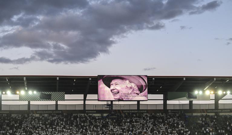 The stadium during a minute of silence after the passing of Queen Elizabeth II during the UEFA Europa League Group A soccer game between Switzerland's FC Zuerich and England's Arsenal, at the Kybunpark stadium, in St. Gallen, Switzerland, 08 September 2022. EPA/GIAN EHRENZELLER
