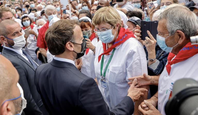 French President Emmanuel Macron arrives for a visit at the Catholic sanctuary of Notre Dame de Lourdes, southwestern France, on July 16, 2021. Macron is on a two-day visit in southwestern France, notably to attend 