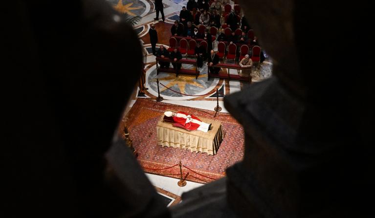 The body of Pope Emeritus Benedict XVI lies in state at St. Peter's Basilica in the Vatican, on January 3, 2023. Benedict, a conservative intellectual who in 2013 became the first pontiff in six centuries to resign, died on December 31, 2022, at the age of 95. Thousands of Catholics began paying their respects on January 2, 2023 to former pope Benedict XVI at St Peter's Basilica at the Vatican, at the start of three days of lying-in-state before his funeral. Andreas SOLARO / AFP