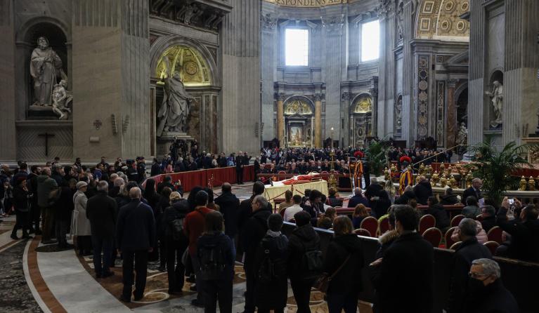 People wait to pay respect to late Pope Emeritus Benedict XVI lying in state inside St. Peter's Basilica, Vatican City, 04 January 2023. Former Pope Benedict XVI died on 31 December 2022 at his Vatican residence, at the age of 95. For three days, starting from 02 January, the body will lay in state in St Peter's Basilica until the funeral on 05 January. EPA/FABIO FRUSTACI