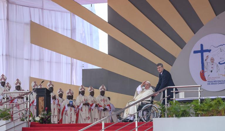 Pope Francis (2nd R) departs after presiding over the mass at the N'Dolo Airport in Kinshasa, Democratic Republic of Congo (DRC), on February 1, 2023. Arsene Mpiana / AFP