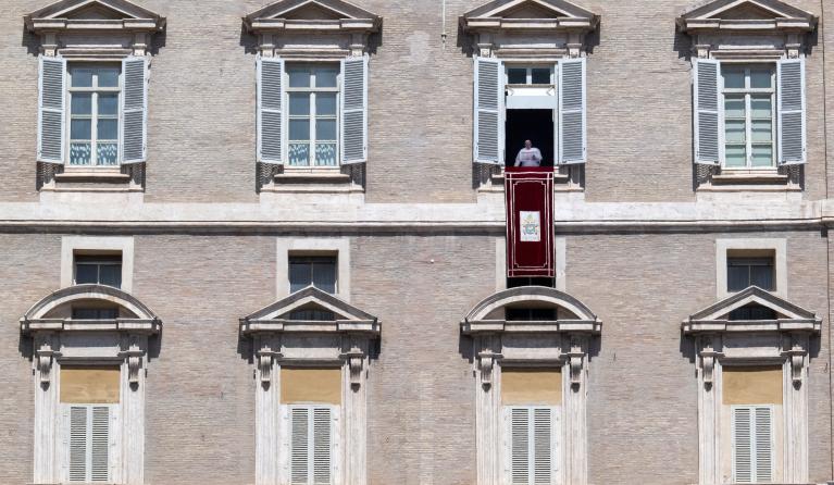 Pope Francis speaks from the window of the apostolic palace overlooking St. Peter's square during the Regina Caeli prayer on April 16, 2023 in The Vatican. Tiziana FABI / AFP