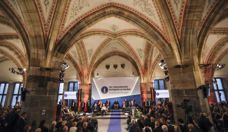  Ukrainian President Volodymyr Zelensky (C) receives the Charlemagne Prize (Karlspreis) during the award ceremony in the town hall of Aachen, Germany, 14 May 2023. This year's prize will be awarded to Ukraine's President Volodymyr Zelensky and the Ukrainian people. The International Charlemagne Prize of Aachen has been awarded annually since 1950 to people who have contributed to the ideals upon which Europe has been founded. EPA/FRIEDEMANN VOGEL