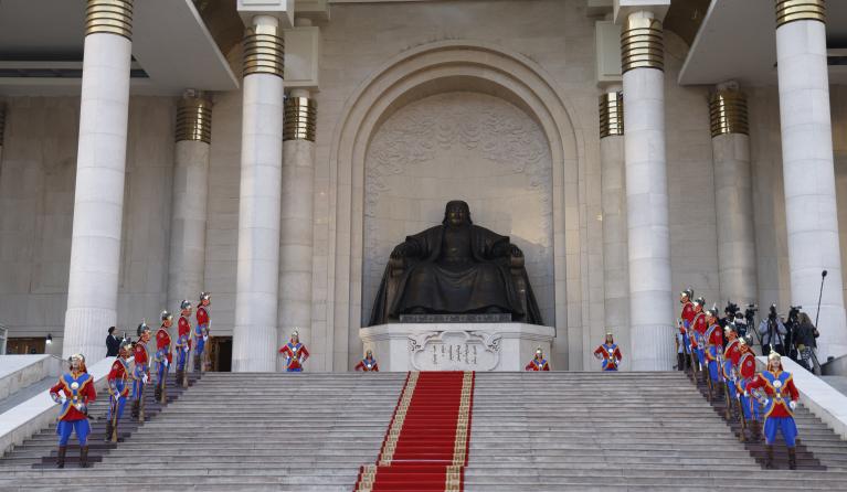 Members of the guard of honour are seen during a ceremonial welcome for France's President Emmanuel Macron at the Government Palace in Ulaanbaatar on May 21, 2023. Ludovic MARIN / AFP