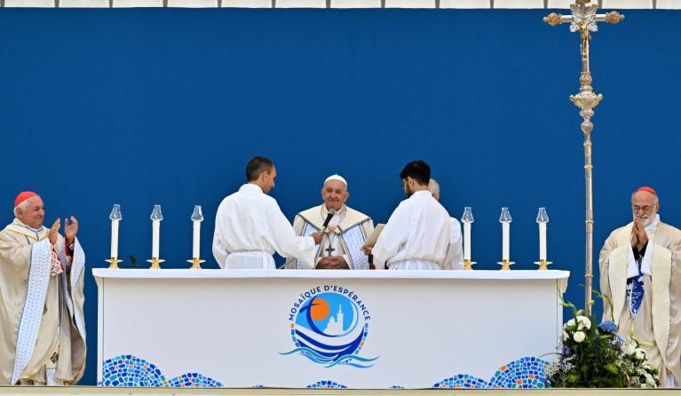Pope Francis celebrates mass at the Velodrome stadium, in the southern port city of Marseille on September 23, 2023. The first Pope in 500 years to visit the city of Marseille, Pope Francis is on a two-day visit for the concluding session of the Mediterranean Meetings, a Church-led initiative aiming to build community amongst the region’s various peoples, religions, and cultures. This is Pope's 44th overseas trip. Andreas SOLARO / AFP