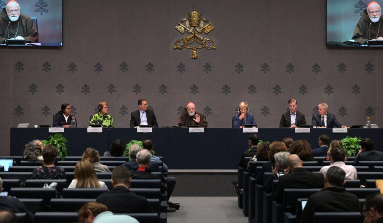 The members of the Pontifical Commission for the Protection of Minors (PCPM) (from left) Niluka Perera, coordinator of the Catholic Care for Children International (CCCI), Teresa Morris Kettelkamp, Bishop Luis Manuel Ali Herrera, psychologist, US Cardinal Sean Patrick O'Malley, Jurist Maud de Boer-Buquicchio and Juan Carlos Cruz, give a press conference to present the first report of the commission, in The Vatican, on October 29, 2024. 