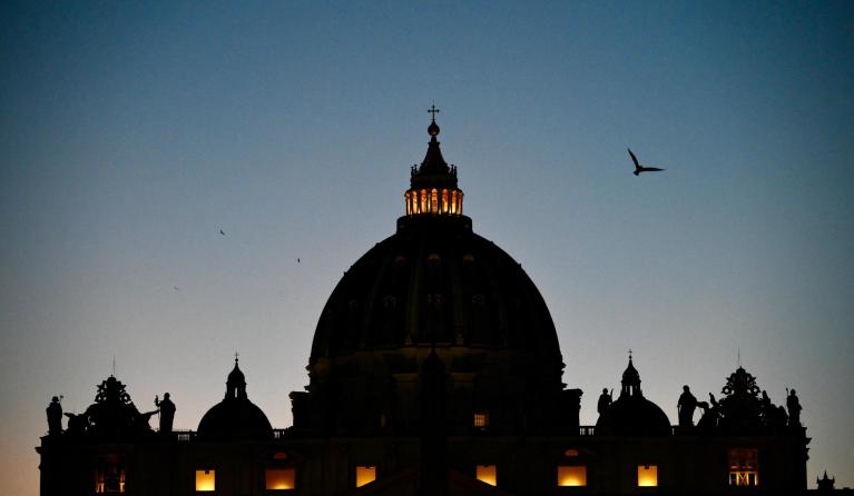A view of St. Peter's Basilica at sunset in Vatican City; EPA