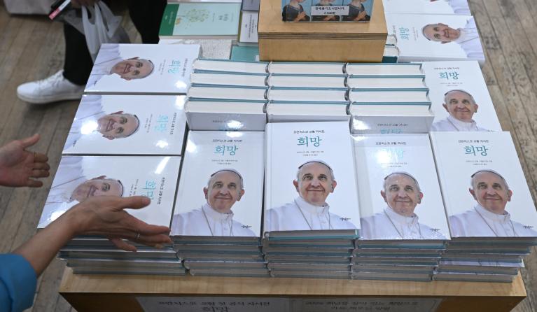 Books of Pope Francis’ autobiography in the Korean language are displayed in a bookstore at Myeongdong Cathedral in Seoul on April 21, 2025. Pope Francis died on April 21, aged 88, a day after making a much hoped-for appearance at Saint Peter's Square on Easter Sunday, the Vatican said in a statement. Jung Yeon-je / AFP