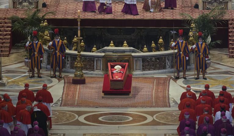 The body of Pope Francis lies in state at St Peter's Basilica, on April 23, 2025. The Pope died of a stroke, the Vatican announced hours after the death on April 21, 2025, of the 88-year-old reformer who inspired devotion but riled traditionalists during 12 years leading the Catholic Church. Andrew Medichini / POOL / AFP